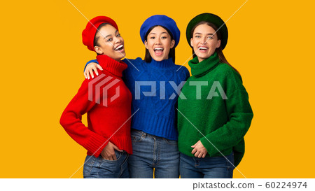 Three Happy Multiethnic Girls Embracing Standing In Studio, Panorama Three Happy Multiethnic Girls Embracing Standing In Studio, Panorama 60224974