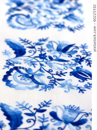 Hand embroidery stitch on a thin canvas. 60225592