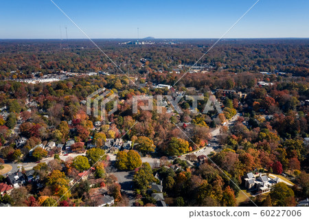 Aerial picture of houses in Midtown Atlanta during the fall and Stone Mountain in the background Aerial picture of houses in Midtown Atlanta during the fall and Stone Mountain in the background 60227006