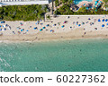 Aerial view of people having a good time on the beach in Miami beach 60227362