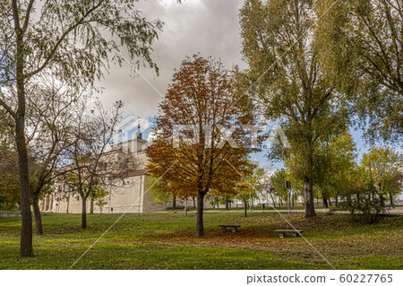 autumnal park and sanctuary of our lady of henar. 60227765