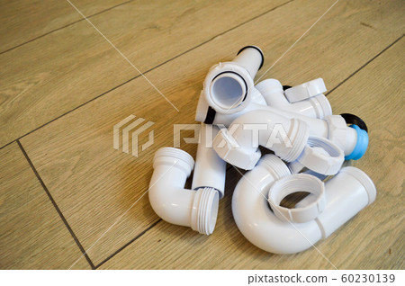 White plastic plumbing, plumbing pipes, smooth  60230139