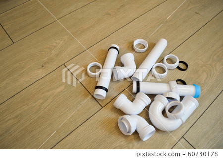 White plastic plumbing, plumbing pipes, smooth 60230178