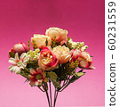 Rustic photo of a bouquet of white and pink peonies flowers on a colored background front view 60231559