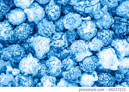 Blue candy popcorn background. Top view. 60237232