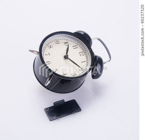 clock or alarm clock with concept on a background 60237320