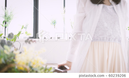 Young woman standing Young woman standing 60239206
