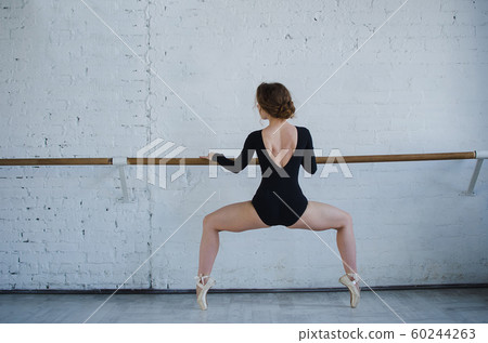 Ballet dancer. Train in the studio. Workout. Ballet dancer. Train in the studio. Workout. 60244263