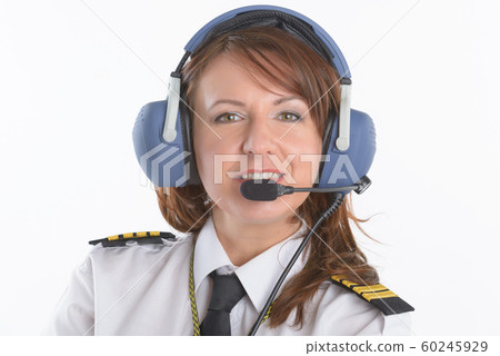 Woman airline pilot with headset 60245929