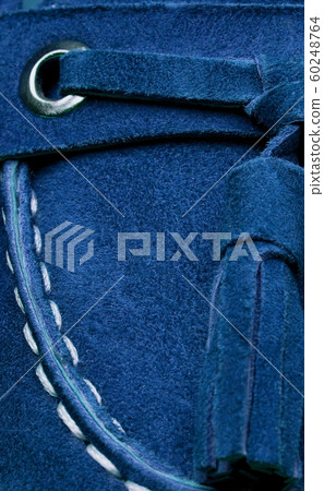 Detail of a blue shoe. 60248764