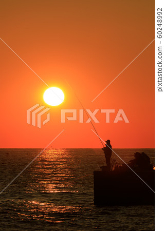 Early morning angler 60248992