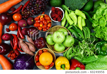 Mixed vegetables and fruits background healthy 60249956