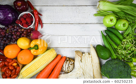 Mixed vegetables and fruits background healthy 60250235