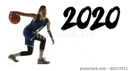 Young caucasian female basketball player on white studio background Young caucasian female basketball player on white studio background 60252911