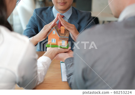 hand protecting house model. home insurance, hand protecting house model. home insurance, 60253224