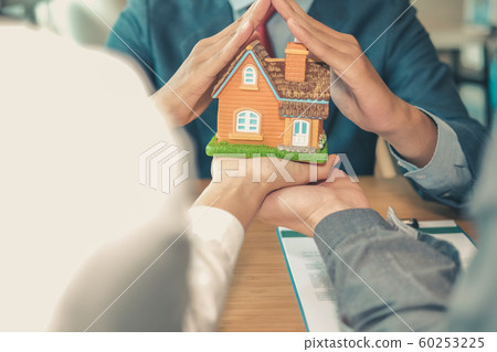 hand protecting house model. home insurance, hand protecting house model. home insurance, 60253225