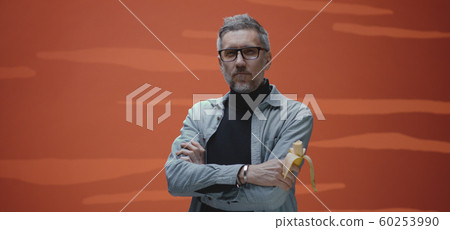 Angry man glaring at camera Angry man glaring at camera 60253990