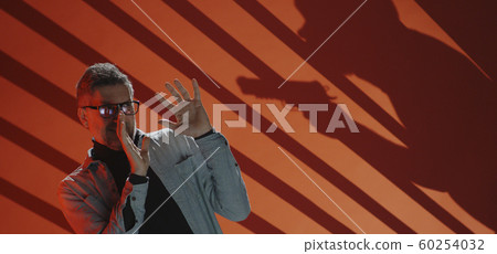 Criminal holding man at gunpoint Criminal holding man at gunpoint 60254032