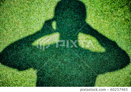 A man with his finger sign pose. A man with his finger sign pose. 60257465