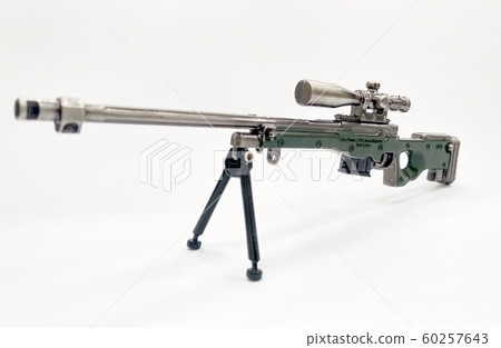 Steel model of military sniper automatic gun in small scale isolated on white background. Sale as a collector item for military gear collector and hobbyist. Steel model of military sniper automatic gun in small scale isolated on white background. Sale as a collector item for military gear collector and hobbyist. 60257643
