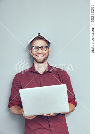 Happy young man having fun in studio 60258293