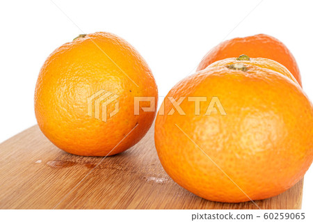 Fresh orange mandarin isolated on white Fresh orange mandarin isolated on white 60259065