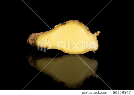 Fresh brown ginger isolated on black glass 60259547