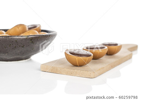 Sweet brown toffee isolated on white Sweet brown toffee isolated on white 60259798