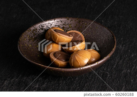 Sweet brown toffee on grey stone Sweet brown toffee on grey stone 60260188