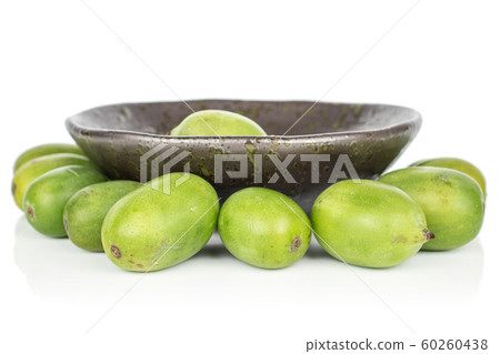 Hardy green kiwi isolated on white Hardy green kiwi isolated on white 60260438