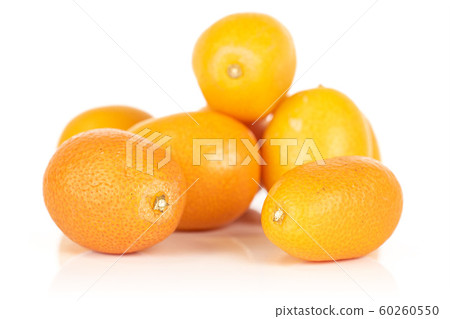 Tasty orange kumquat isolated on white Tasty orange kumquat isolated on white 60260550