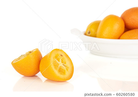 Tasty orange kumquat isolated on white 60260580
