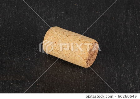 Common wine cork on grey stone 60260649