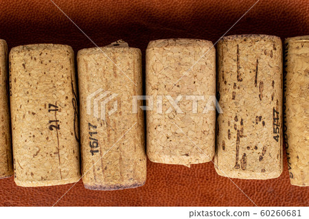 Common wine cork on cognac leather Common wine cork on cognac leather 60260681