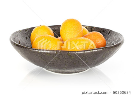 Tasty orange kumquat isolated on white Tasty orange kumquat isolated on white 60260684