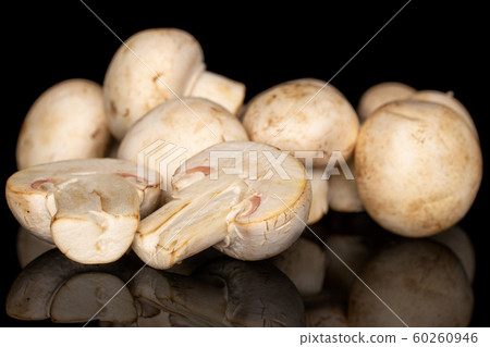 Fresh white mushroom isolated on black glass 60260946