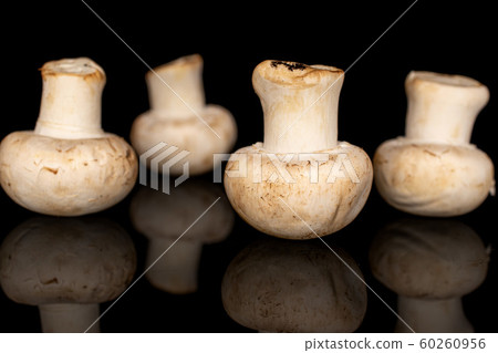 Fresh white mushroom isolated on black glass 60260956