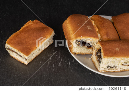Czech sweet bun on grey stone Czech sweet bun on grey stone 60261148