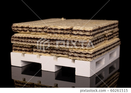 Chocolate biscuit wafer isolated on black glass Chocolate biscuit wafer isolated on black glass 60261515