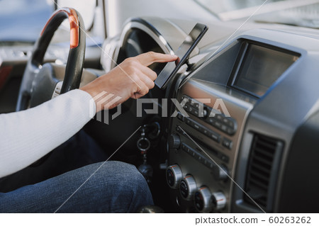 Caucasian man searching destination with navigator Caucasian man searching destination with navigator 60263262