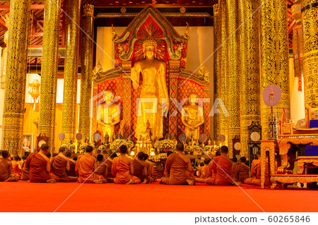 Monk prayer in Buddha days in Wat Chedi Luang Temple. Monk prayer in Buddha days in Wat Chedi Luang Temple. 60265846