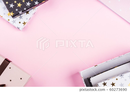 Gift boxes frame on pink. Festive concept flat lay 60273690