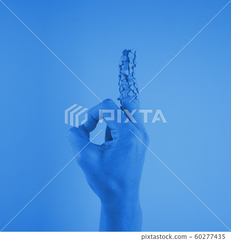 Hand shows aggressive ok gesture with the middle 60277435