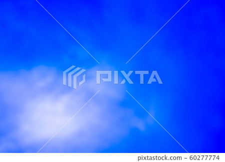 fluffy blur clouds in the bright blue sky 60277774