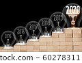 Light Bulbs with New Year 2020 60278311
