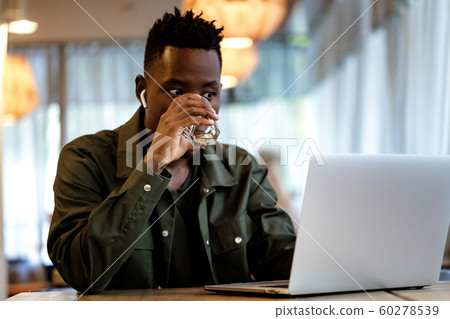 african american man using computer african american man using computer 60278539
