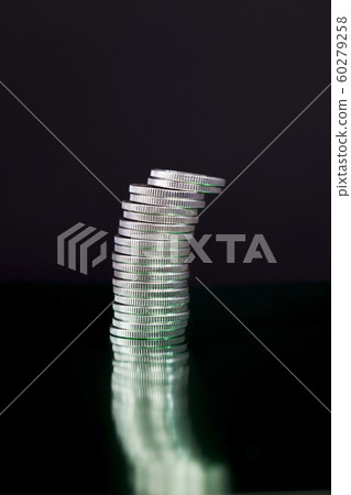 pile of coins 60279258