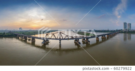 Long Bien Bridge and Red River, Ha Noi, Viet Nam. Panorama Reflect Aerial Drone Shot in Sunset 60279922
