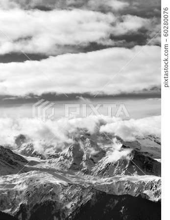 View on snow mountains and sunlight cloudy sky at 60280076