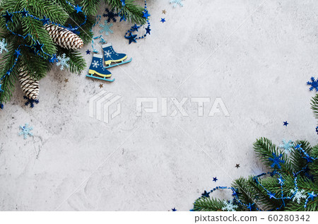 Christmas of New Year background with fir branches and blue baubles on a gray concrete. 60280342